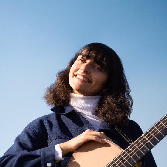 Matilde playing guitar